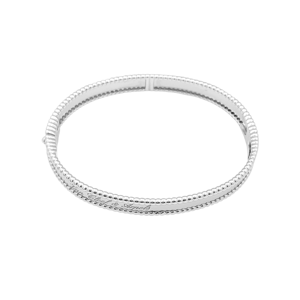 Bracelet Jonc VAN CLEEF & ARPELS "Perlée Signature" en or blanc et perles - Castafiore