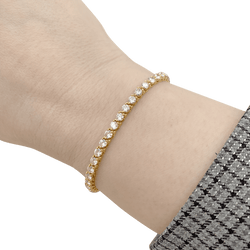 Bracelet Ligne CARTIER en or jaune et diamants. - Castafiore