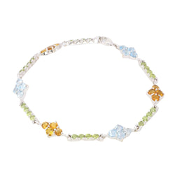 Bracelet Ligne en or blanc, citrines, péridots et topazes - Castafiore