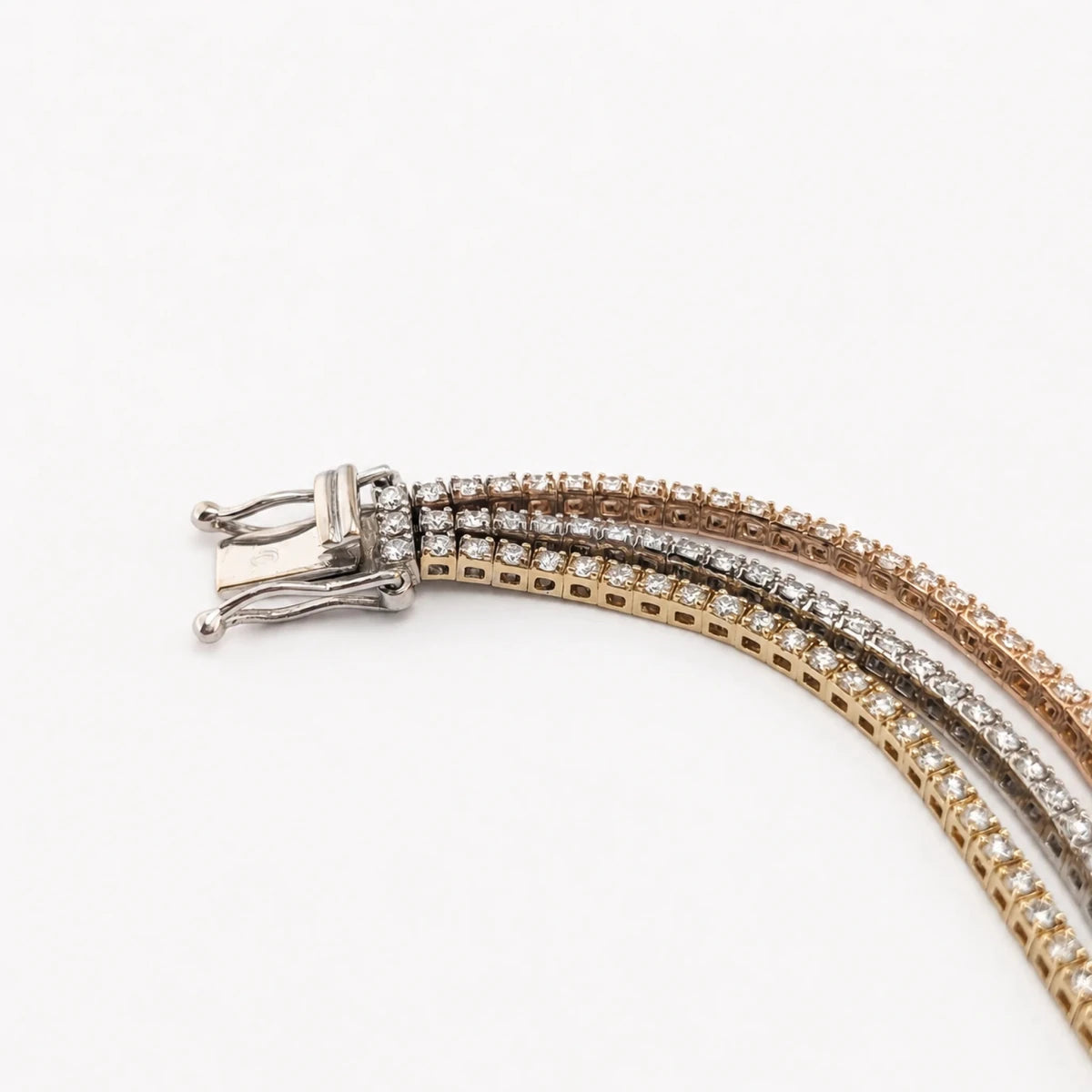 Bracelet Ligne en or blanc, or jaune, or rose et diamants - Castafiore