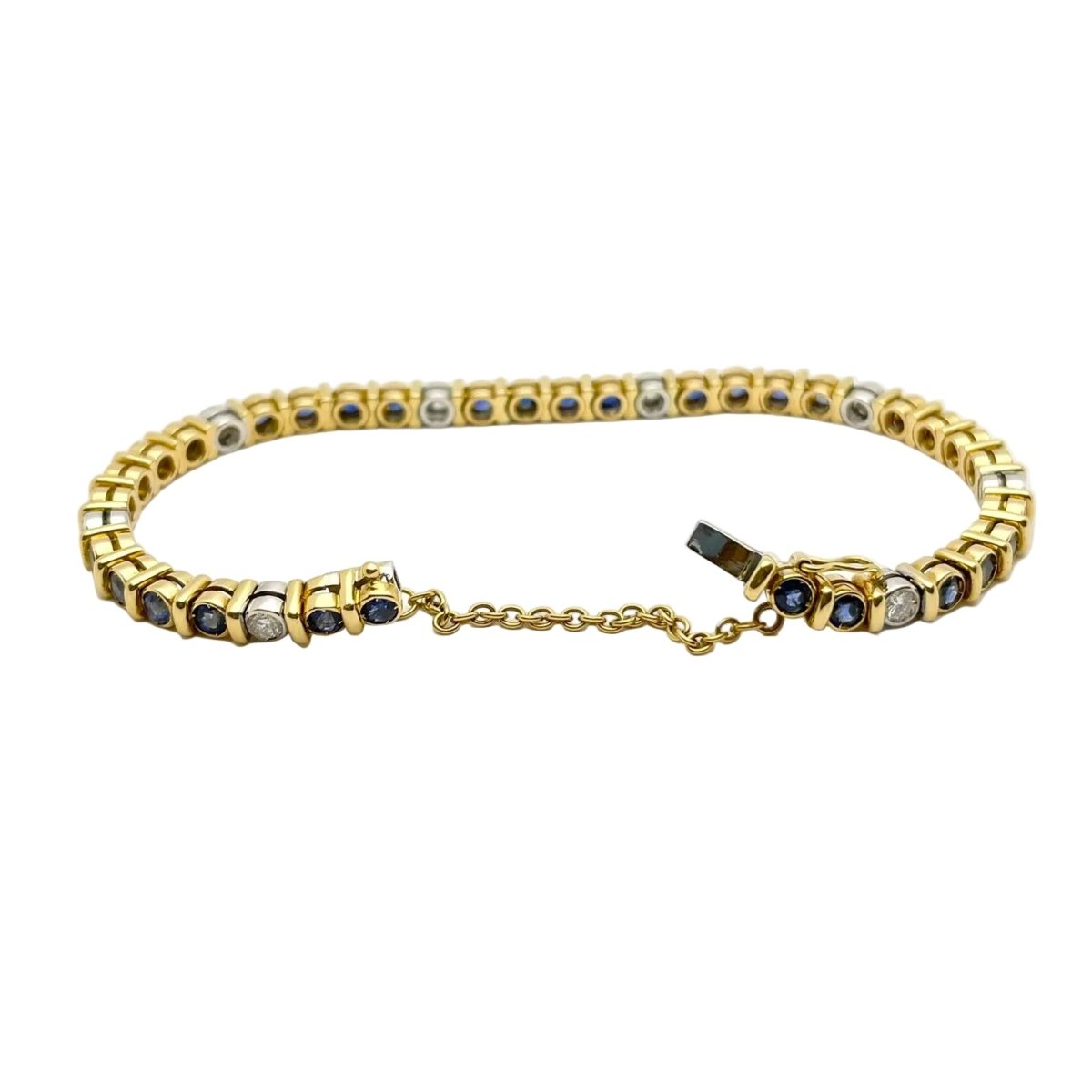 Bracelet Ligne en or blanc, or jaune, saphirs et diamants - Castafiore