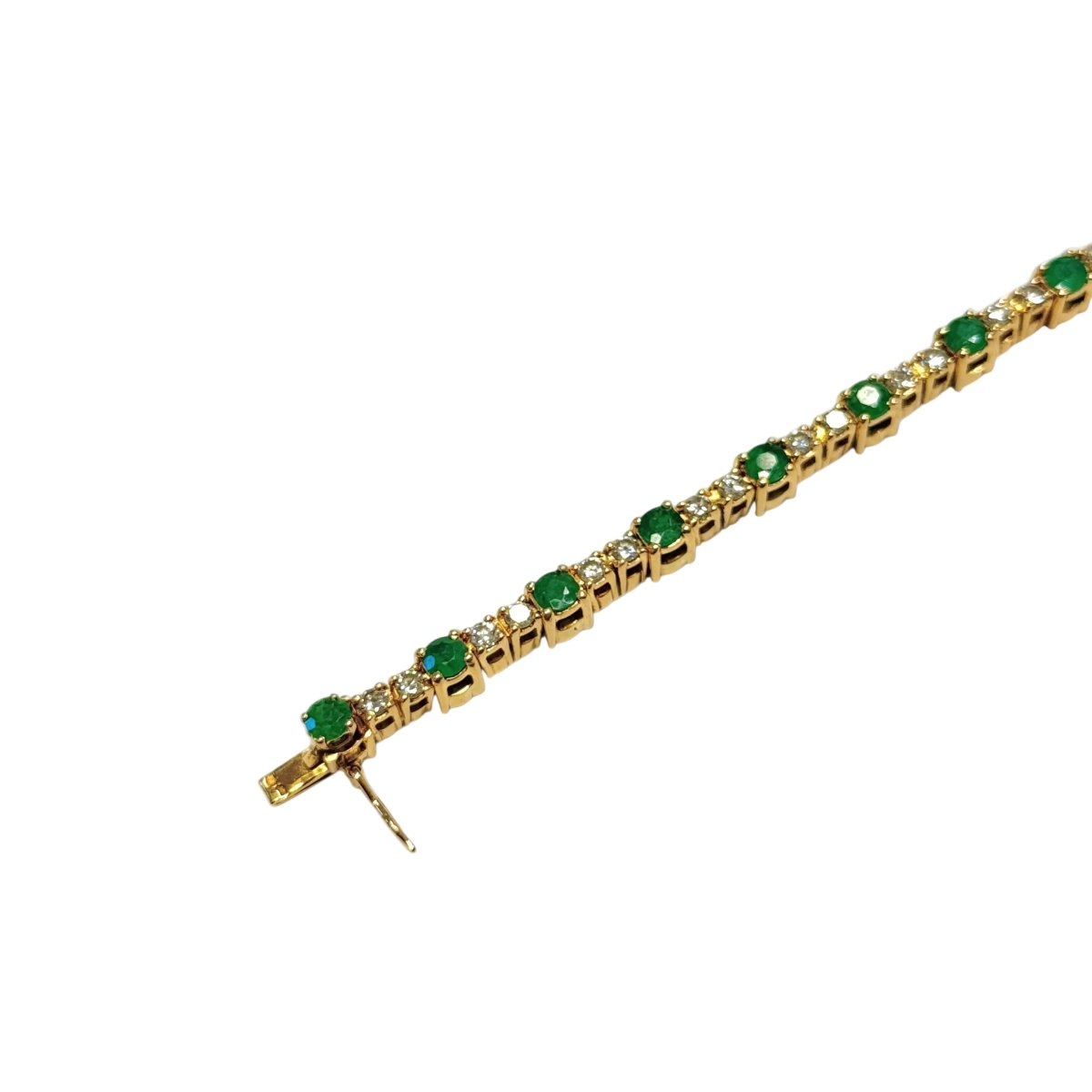 Bracelet Ligne en or jaune, émeraudes et diamants - Castafiore