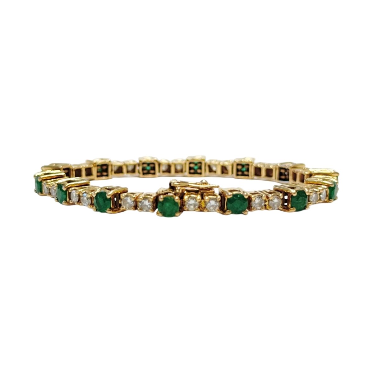 Bracelet Ligne en or jaune, émeraudes et diamants - Castafiore