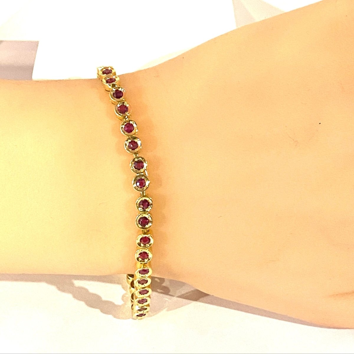 Bracelet ligne en or jaune et rubis - Castafiore
