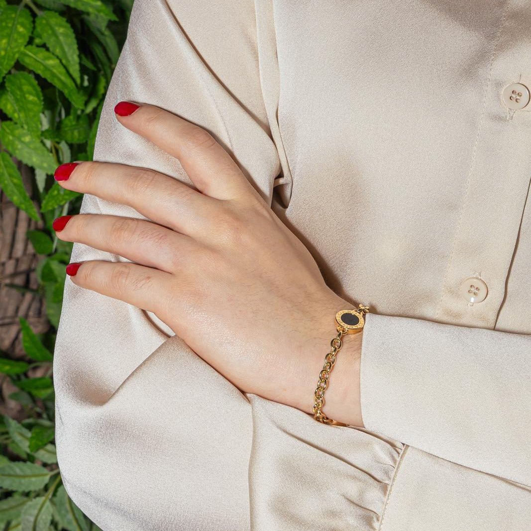 Bracelet Maille BULGARI en or jaune et onyx - Castafiore