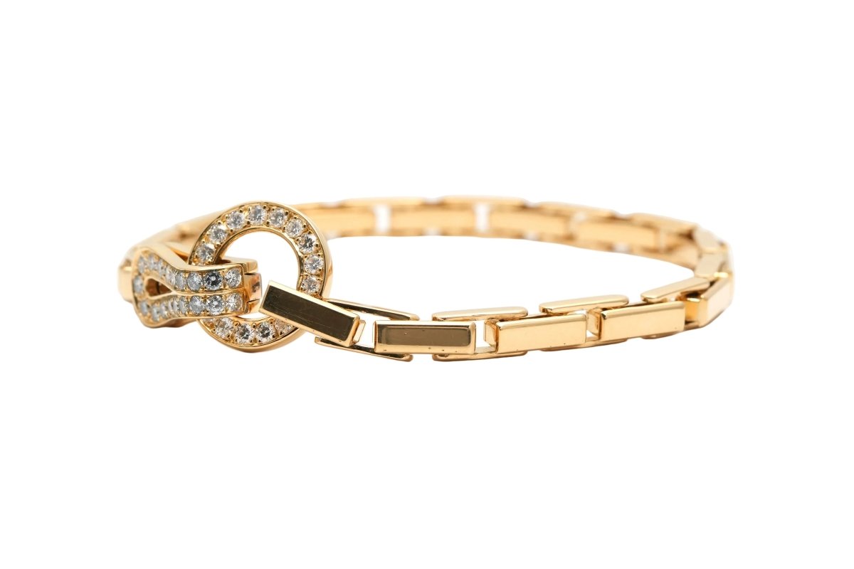 Bracelet Maille CARTIER "Agrafe" en or jaune et diamants - Castafiore