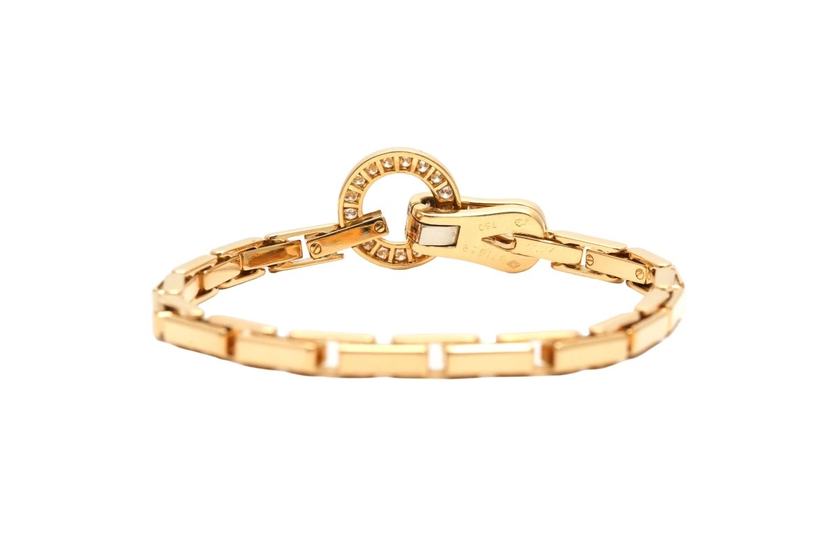 Bracelet Maille CARTIER "Agrafe" en or jaune et diamants - Castafiore