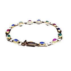 Bracelet Maille en or jaune, saphirs, émeraudes et rubis - Castafiore