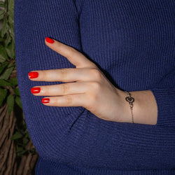 Bracelet Maille O.J. PERRIN "Coeur Légendes" en or blanc - Castafiore