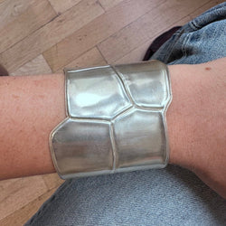 Bracelet Manchette HERMÈS "Niloticus Éclat" en argent - Castafiore