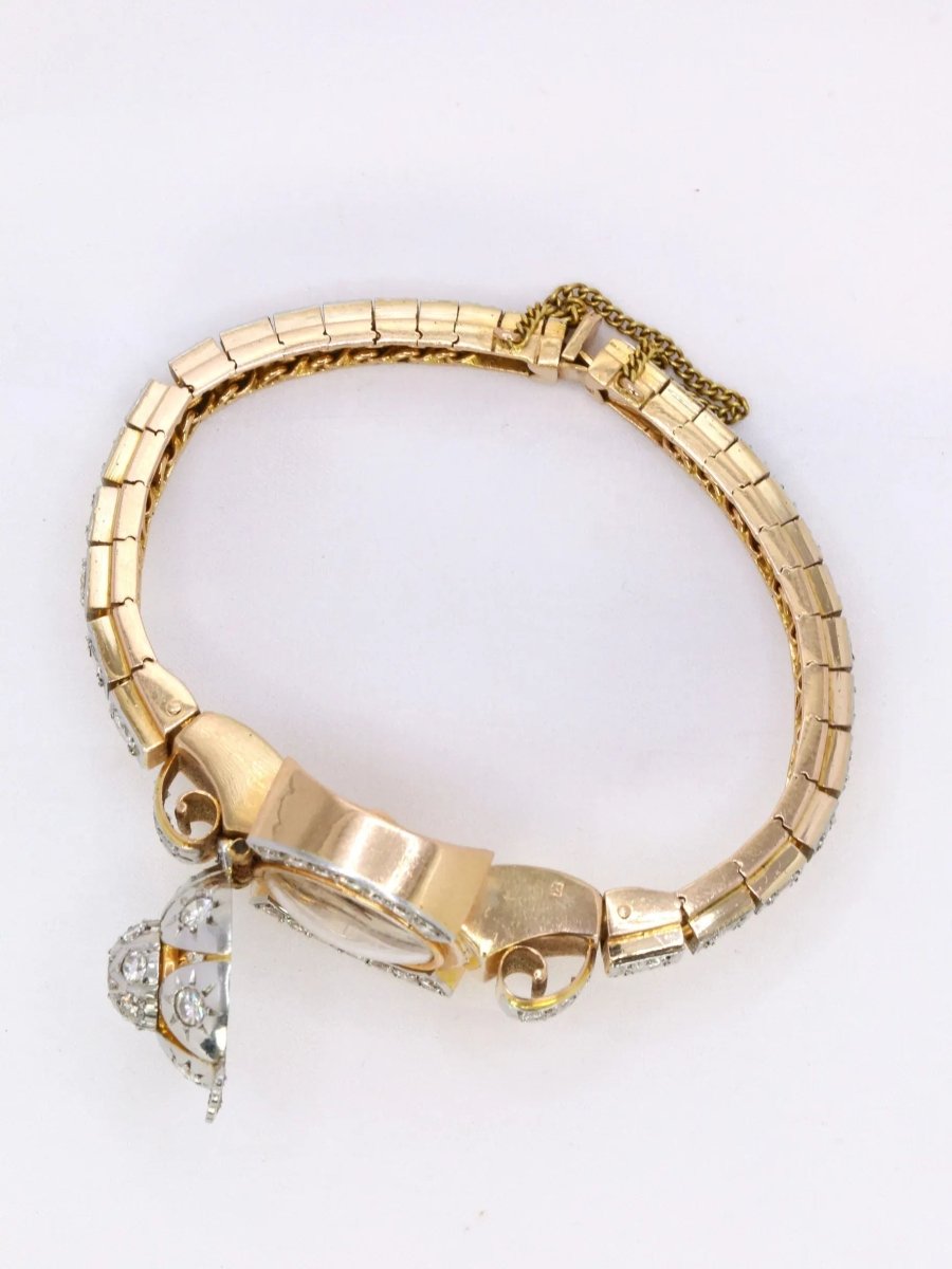 Bracelet Montre vintage en or jaune et diamants, 1950 - Castafiore