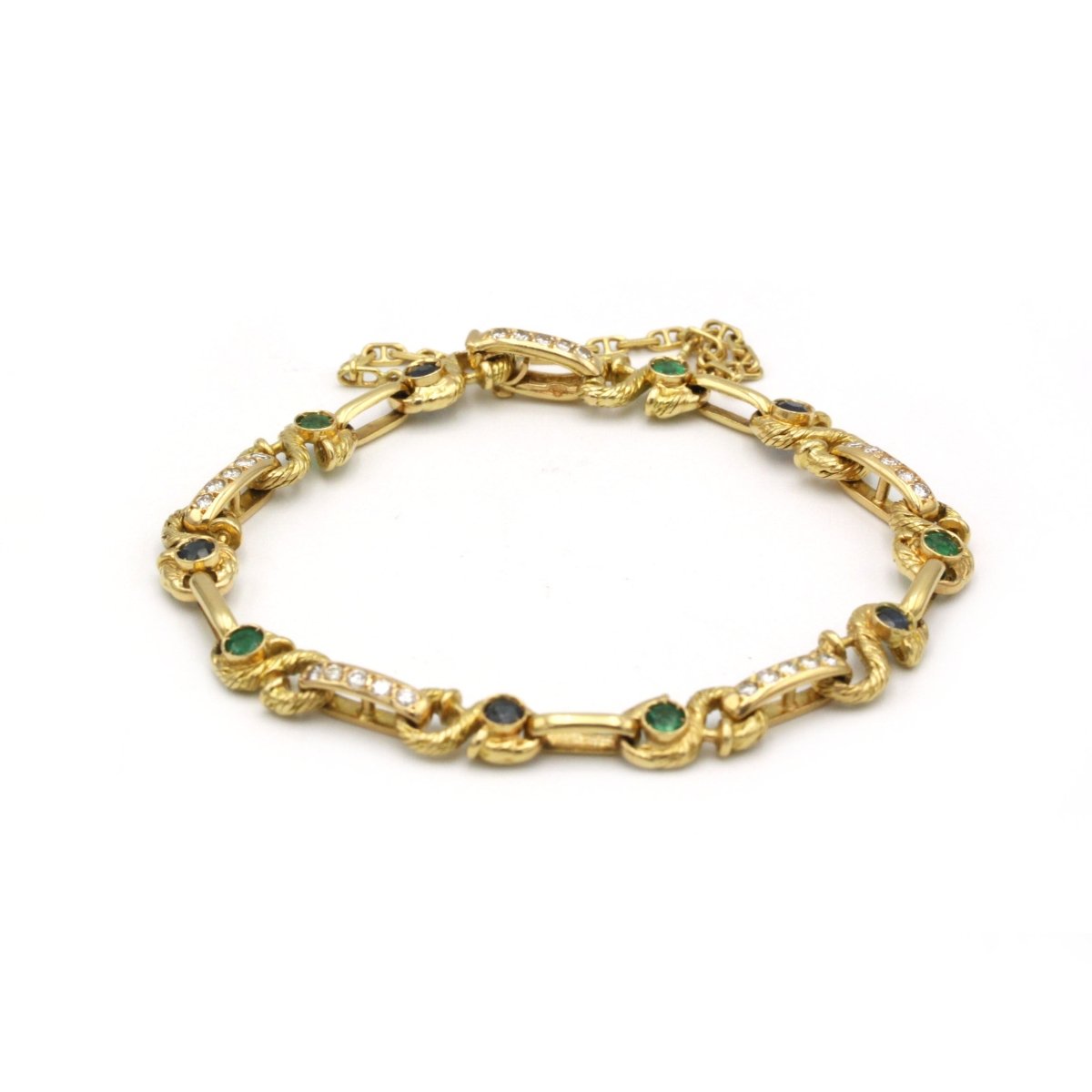 Bracelet - Or, diamants, saphirs et émeraudes - Castafiore