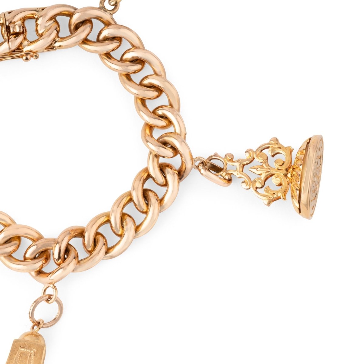 Bracelet or rose 18k,maillon gourmette orné de 4 breloques - Castafiore