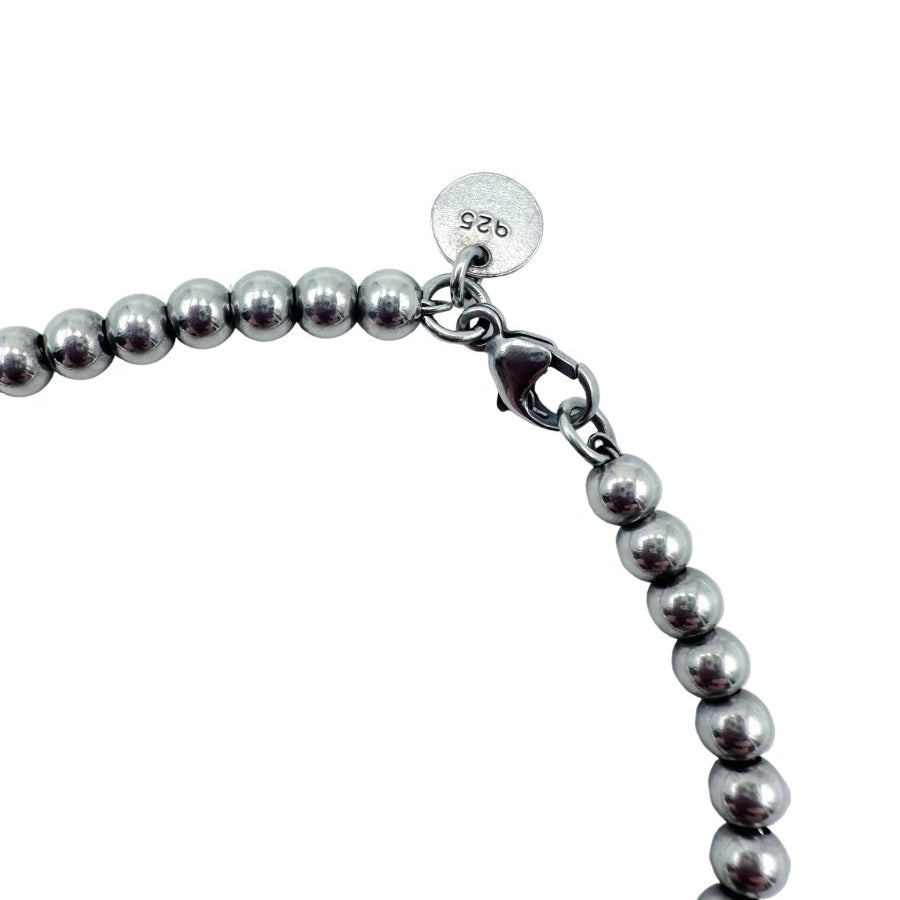 Bracelet Perles TIFFANY & CO. "Return to Tiffany" en argent et émail - Castafiore