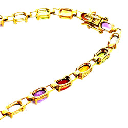 Bracelet Pierres fines en or jaune grenats, péridots, aigue - marines, citrines, améthystes - Castafiore