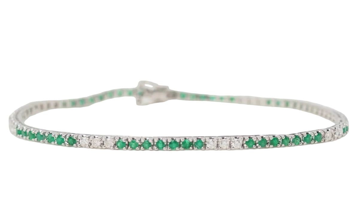 Bracelet rivière en or blanc, émeraudes et diamants - Castafiore