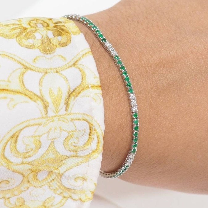 Bracelet rivière en or blanc, émeraudes et diamants - Castafiore
