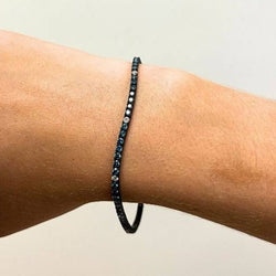 Bracelet Riviere en or blanc et diamants bleus et blancs - Castafiore