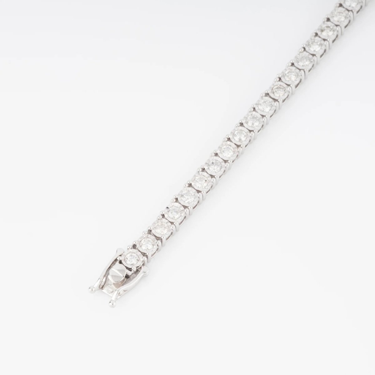 Bracelet riviere et or gris orné de diamant - Castafiore
