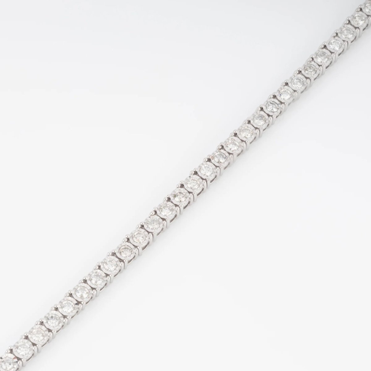 Bracelet riviere et or gris orné de diamant - Castafiore