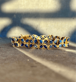Bracelet rosaces en or jaune et saphirs - Castafiore