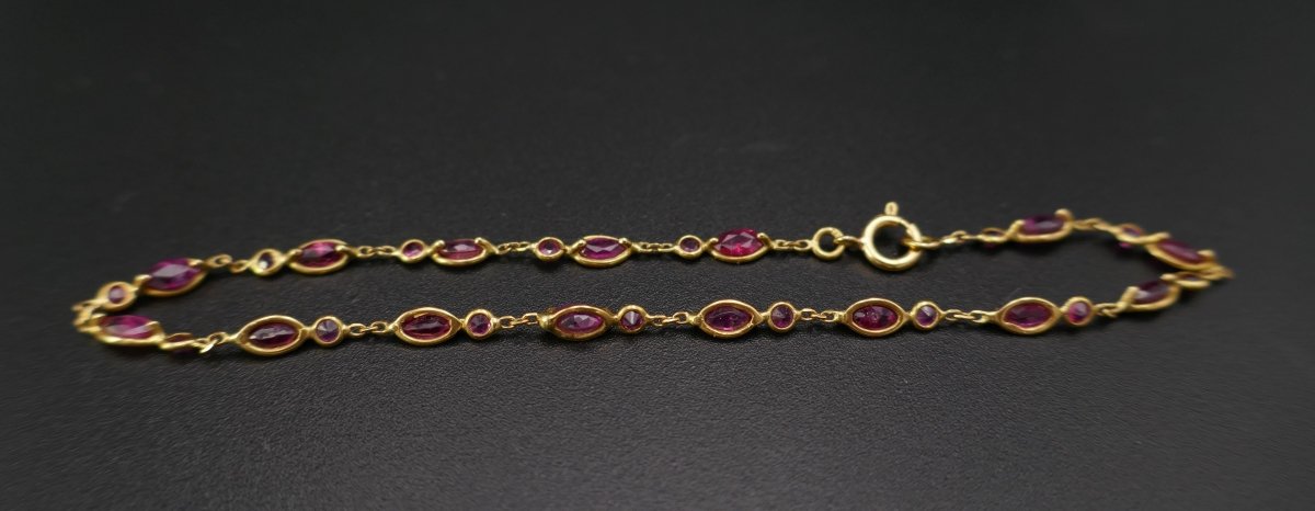 Bracelet Serti De 30 Rubis, Or 18 Carats. - Castafiore