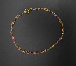Bracelet Serti De 30 Rubis, Or 18 Carats. - Castafiore