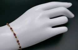 Bracelet Serti De 30 Rubis, Or 18 Carats. - Castafiore