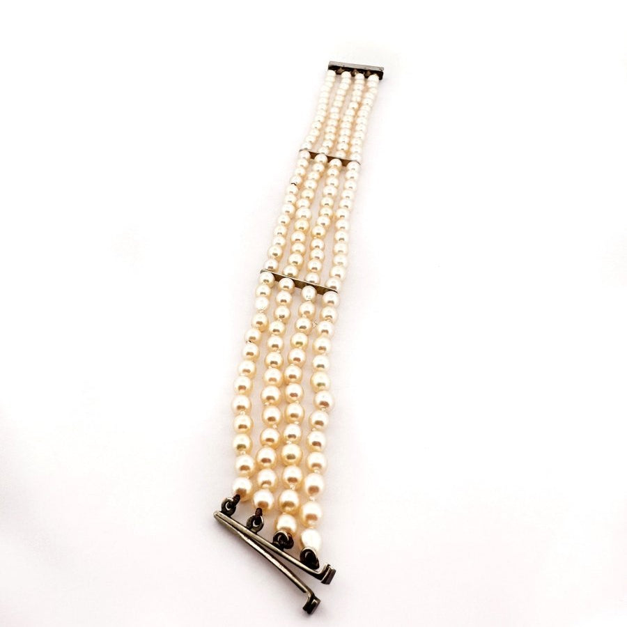 Bracelet Souple 4 rangs de perles blanches or blanc et diamants - Castafiore