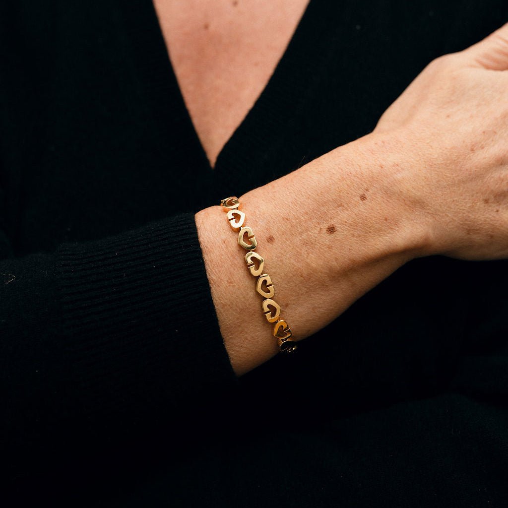 Bracelet Souple CARTIER "Coeurs et Symboles" en or jaune - Castafiore