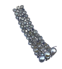 Bracelet Souple en or blanc, perles, saphirs et diamants - Castafiore