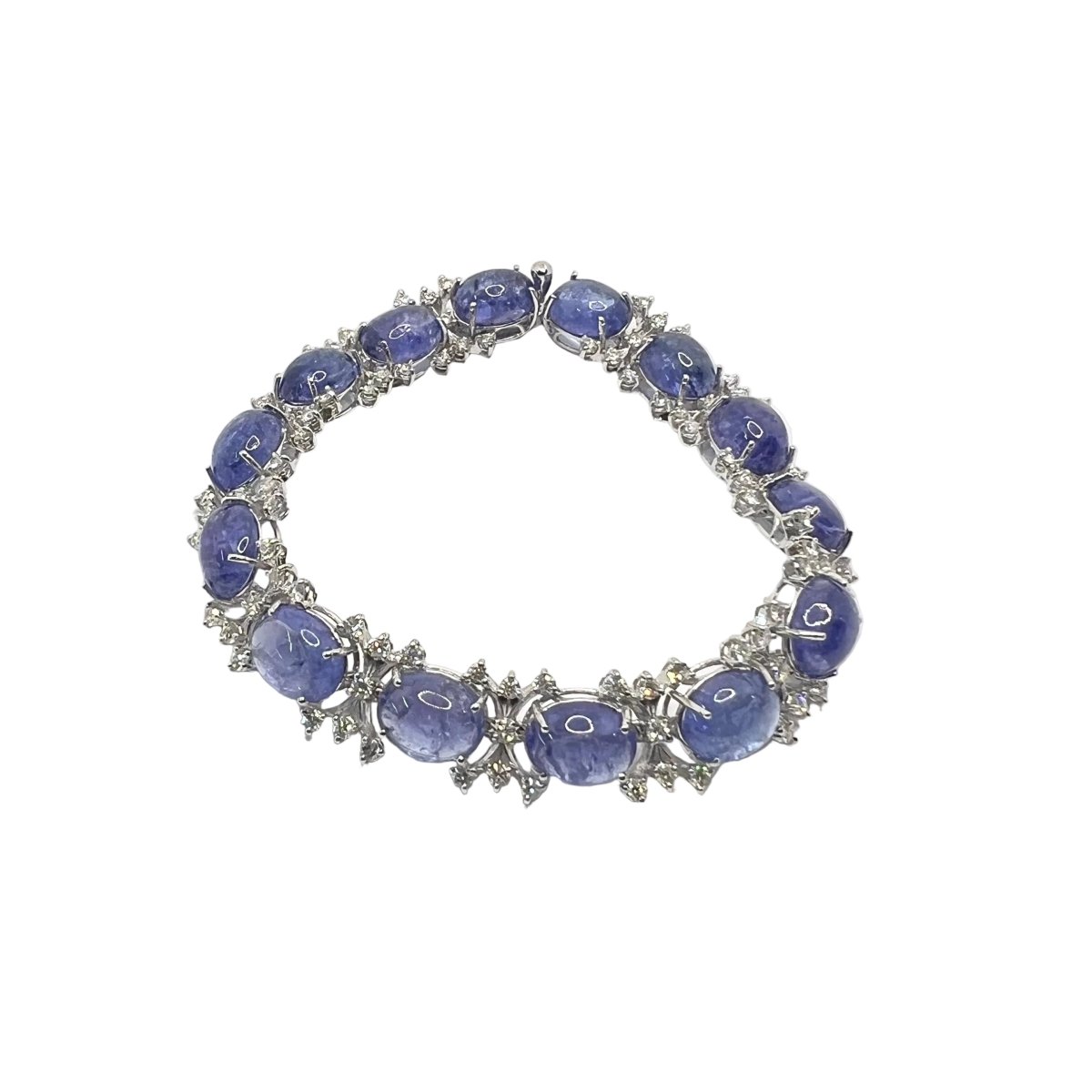 Bracelet Souple en or blanc, tanzanites et diamants - Castafiore