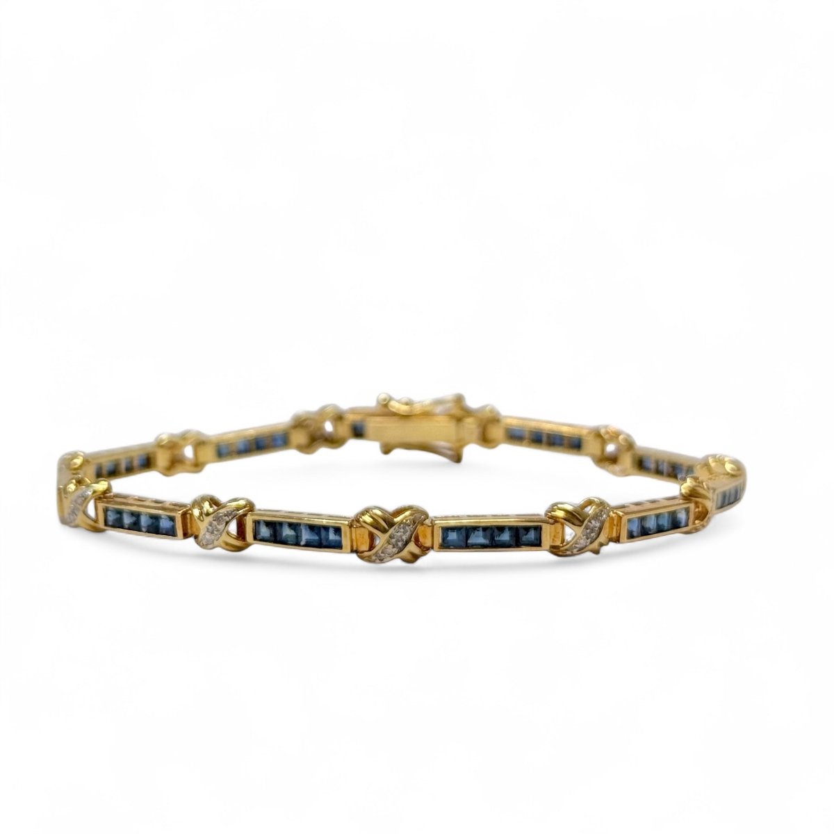 Bracelet souple en or jaune, saphirs et diamants - Castafiore