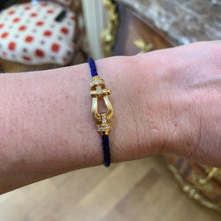 Bracelet Souple FRED "Force 10" en or jaune, acier et diamants - Castafiore