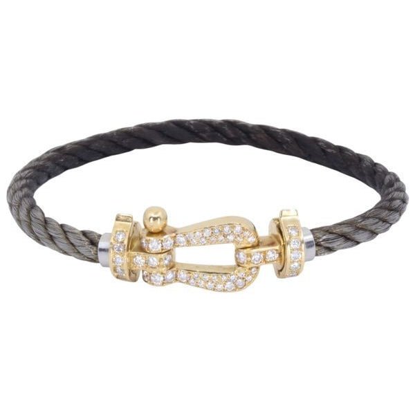 Bracelet Souple FRED "Force 10" en or jaune, acier et diamants - Castafiore