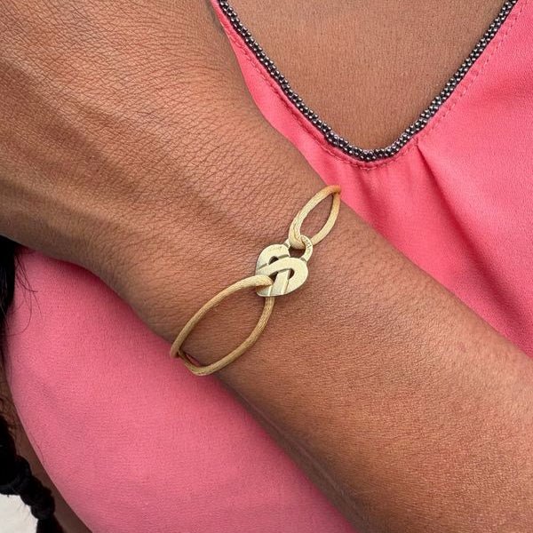 Bracelet Souple POIRAY "Coeur Entrelacé Métal" en or jaune - Castafiore