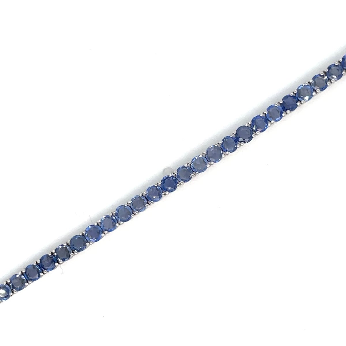 Bracelet tennis en or avec saphir bleu naturel - Castafiore