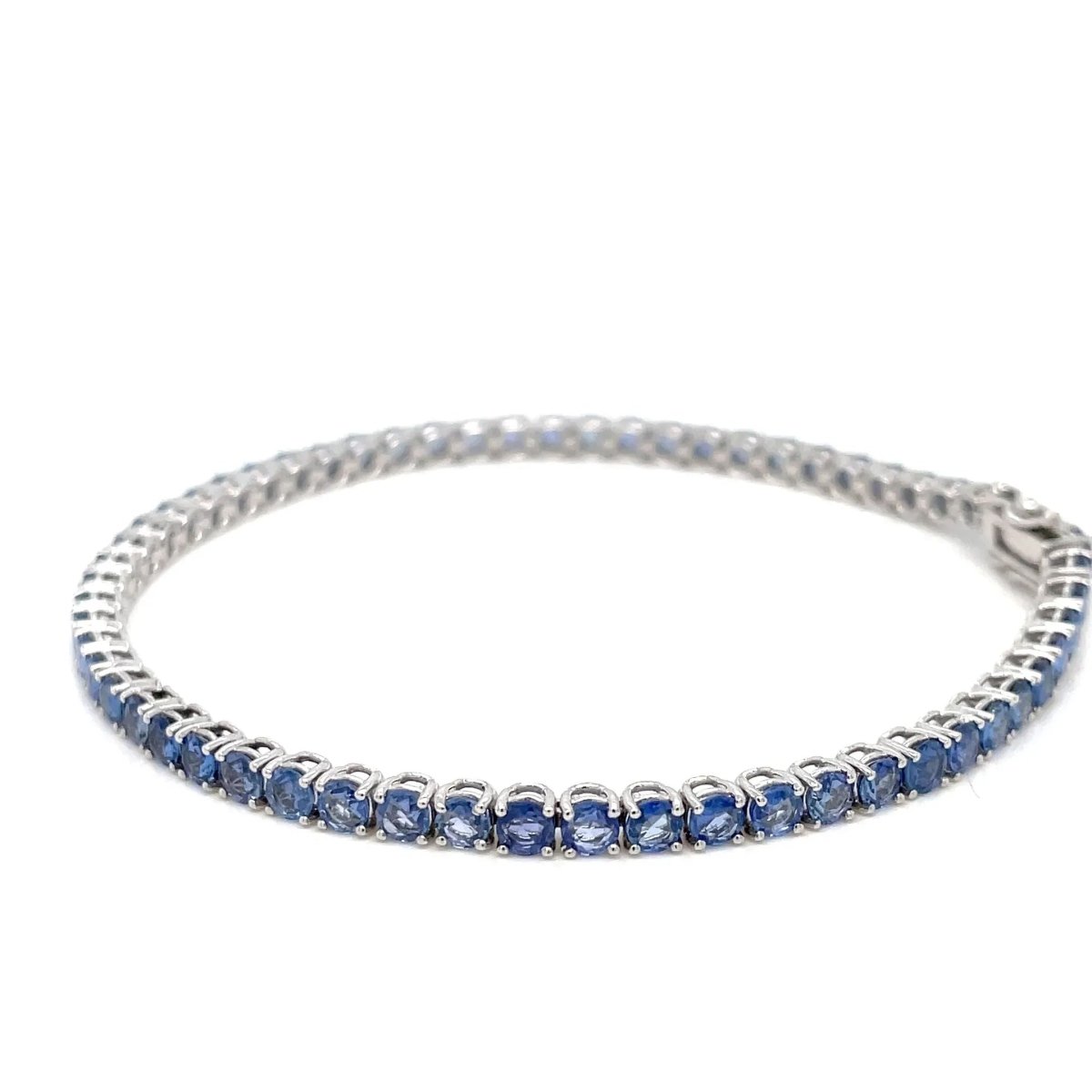 Bracelet tennis en or avec saphir bleu naturel - Castafiore