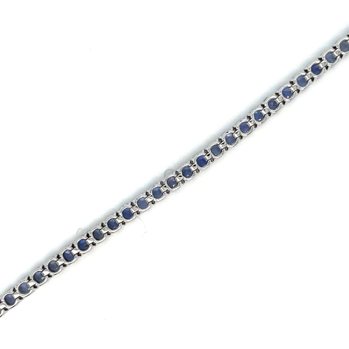 Bracelet tennis en or avec saphir bleu naturel de 7 carats - Castafiore