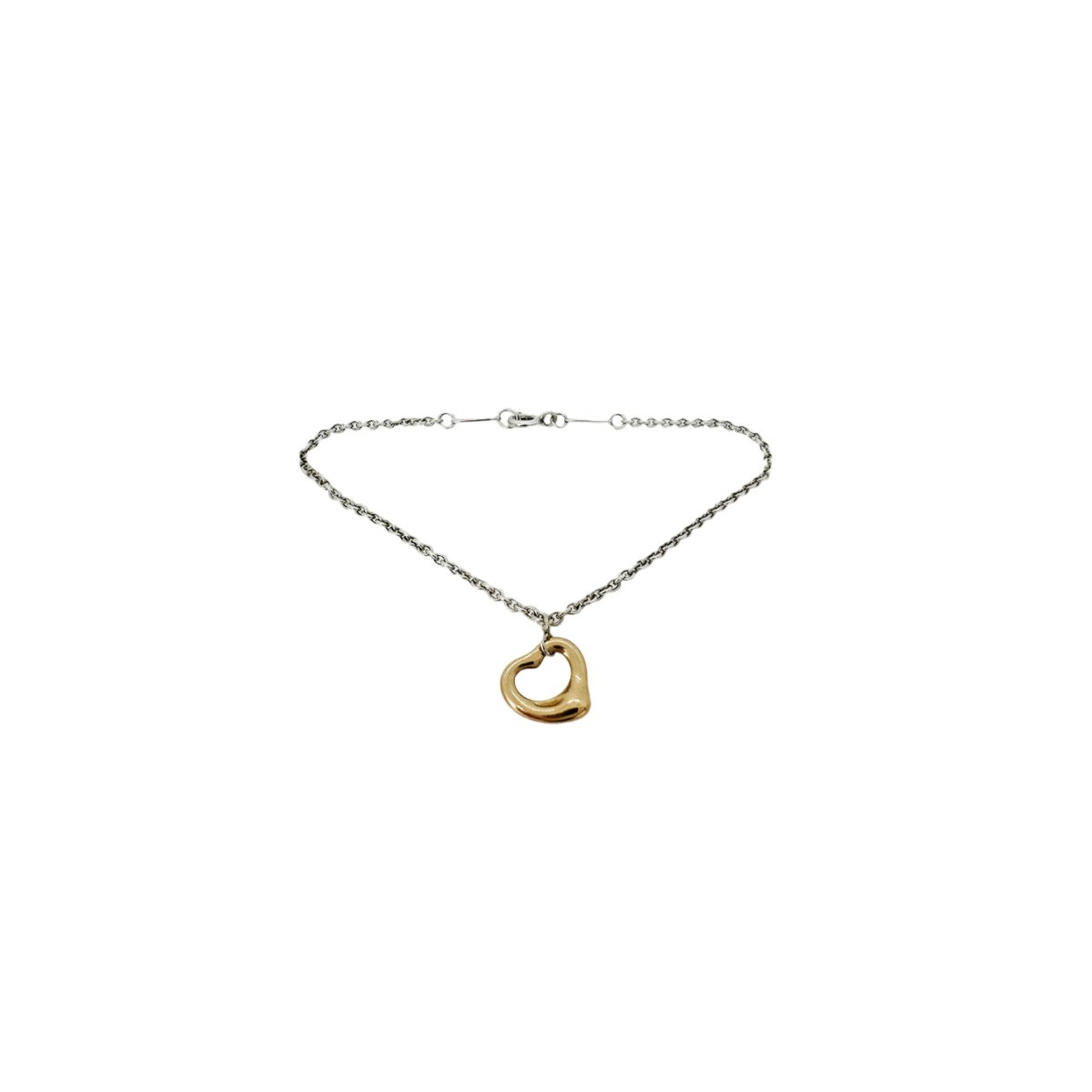 Bracelet TIFFANY & CO. par ELSA PERETTI "Open Heart" en or rose et argent - Castafiore