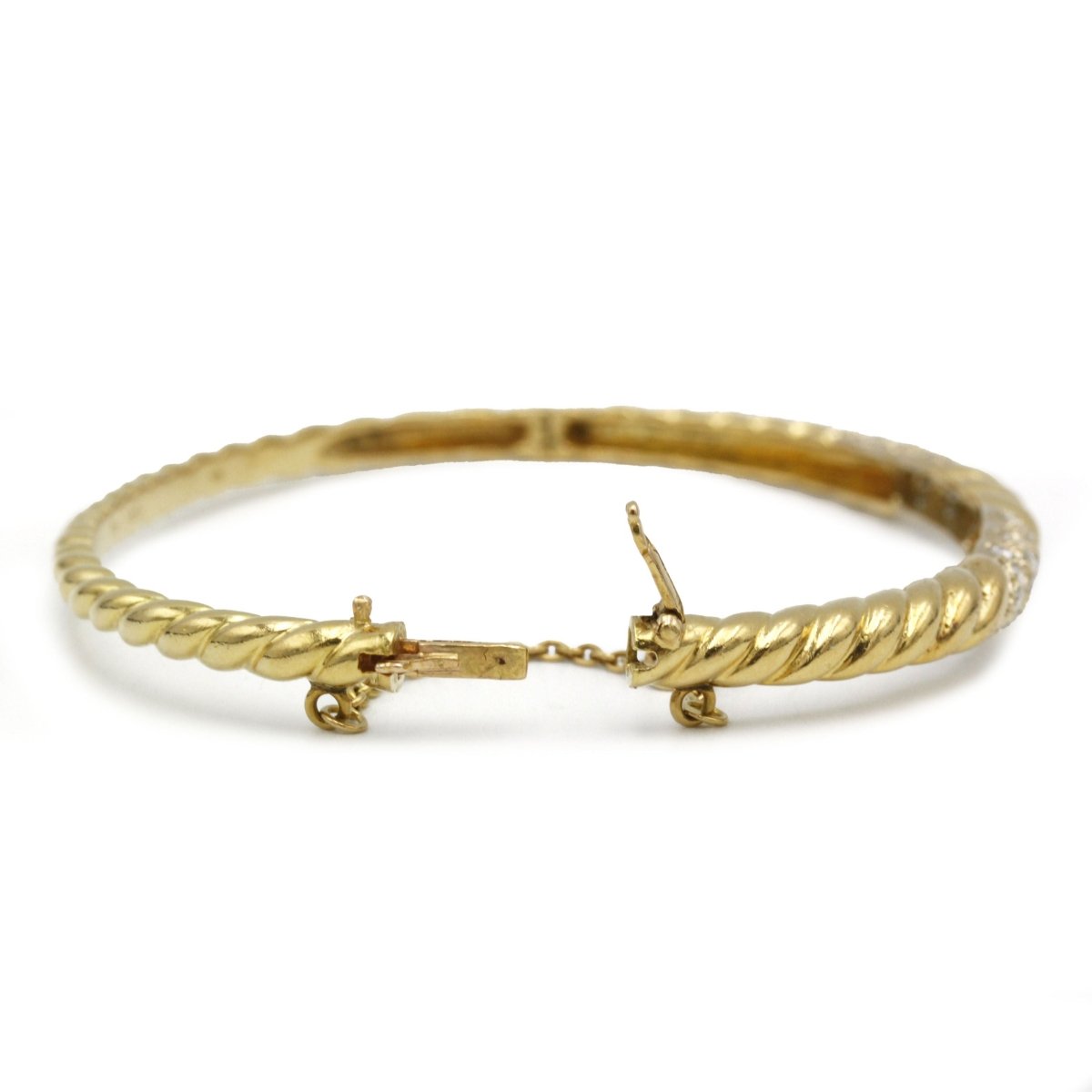 Bracelet Torsadé POIRAY en or jaune et diamants - Castafiore