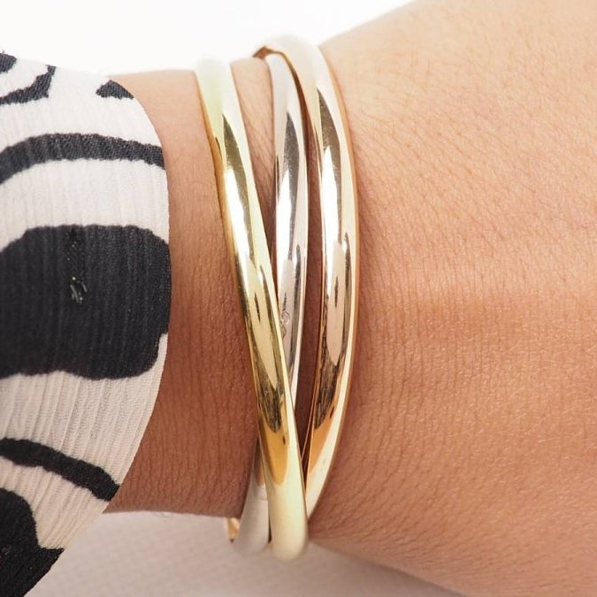 Bracelet Trinity de Cartier d'occasion trois ors - Castafiore