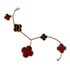 Bracelet VAN CLEEF & ARPELS "Magic Alhambra" en or jaune, oeil - de - tigre et cornaline - Castafiore