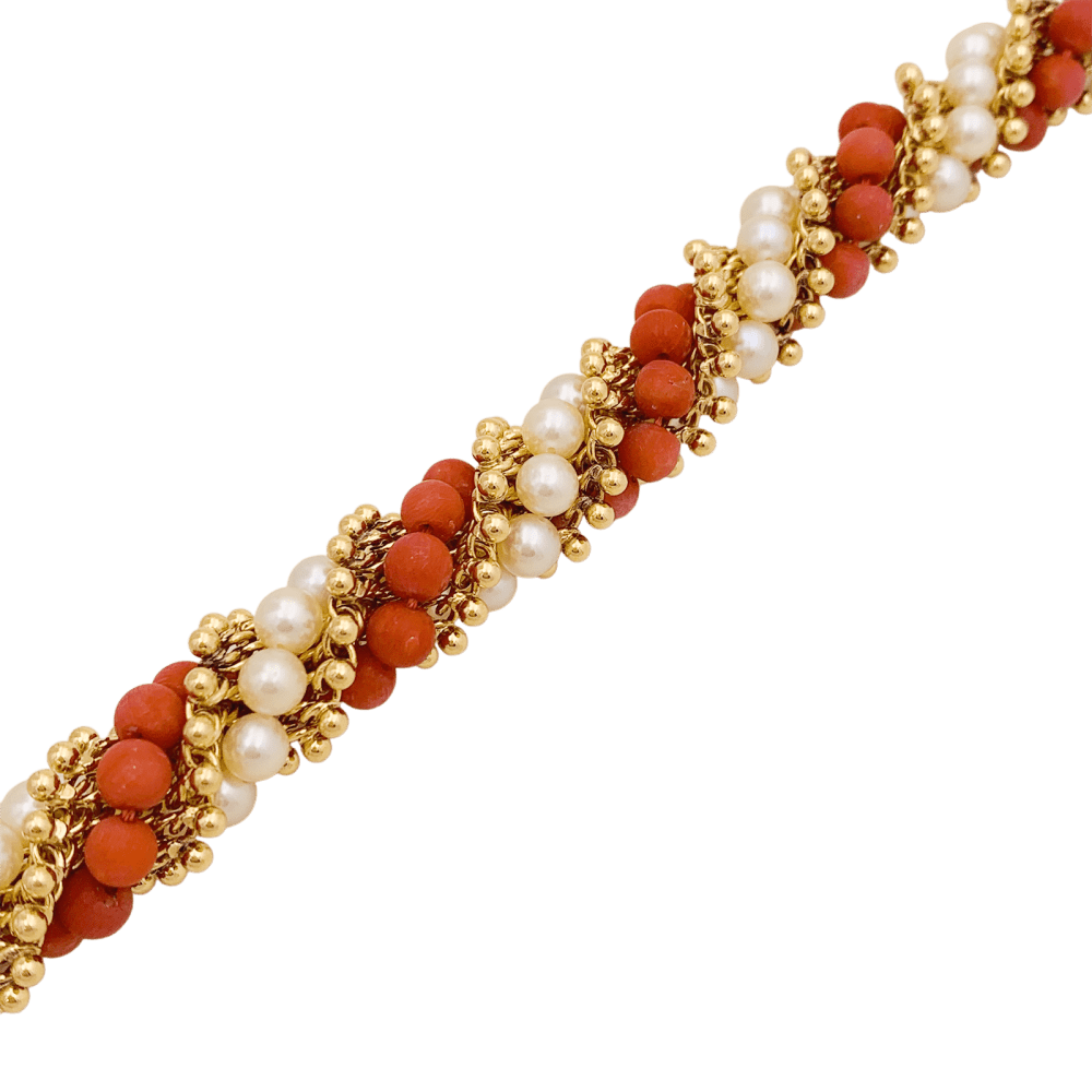 Bracelet VAN CLEEF & ARPELS "Twist" en or jaune, perles et corail - Castafiore