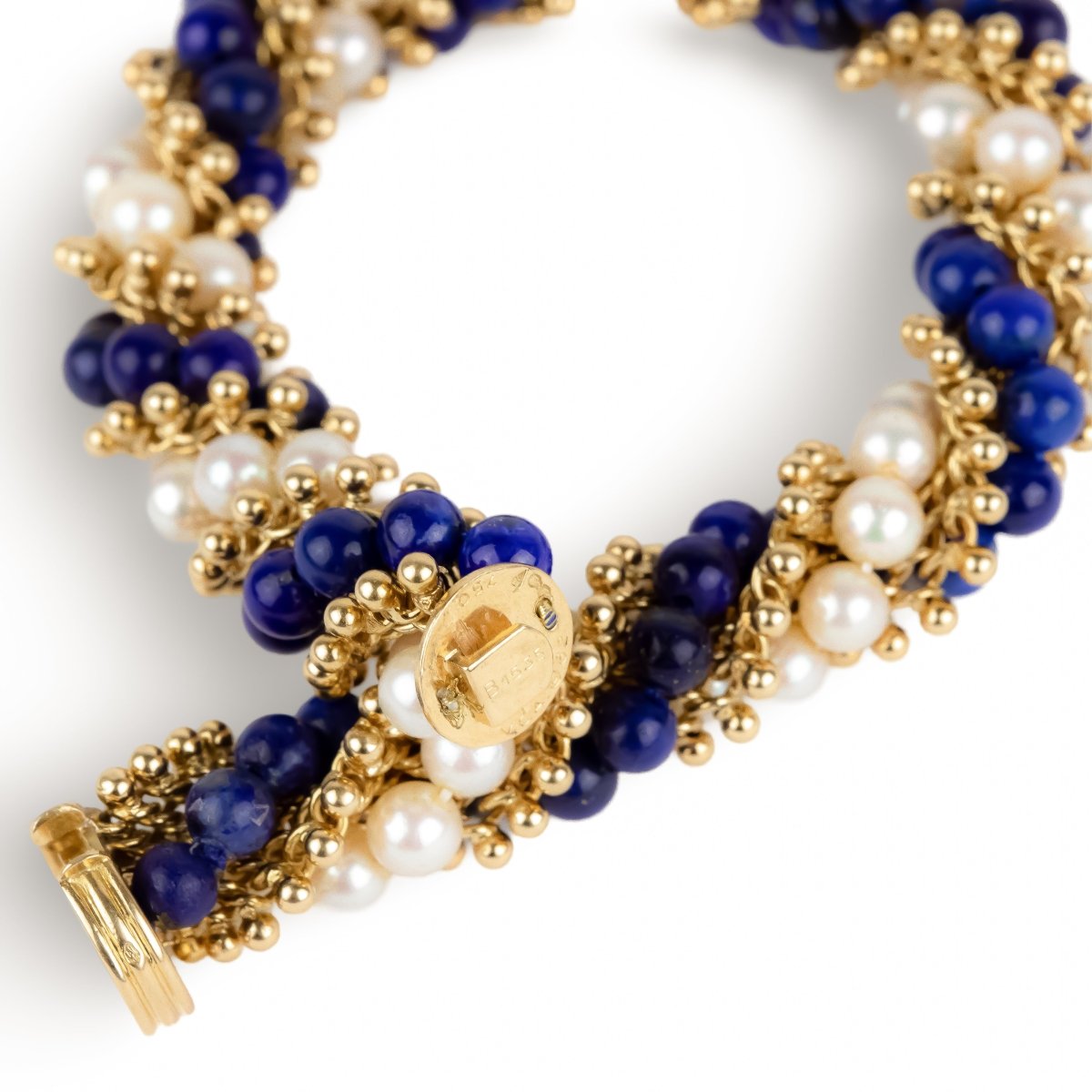 Bracelet VCA "Twist" en or jaune, perles et lapis - lazuli - Castafiore