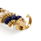 Bracelet VCA "Twist" en or jaune, perles et lapis - lazuli - Castafiore