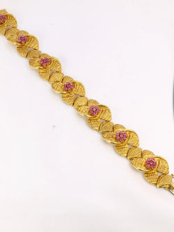 Bracelet vintage fleur en or amati et rubis - Castafiore