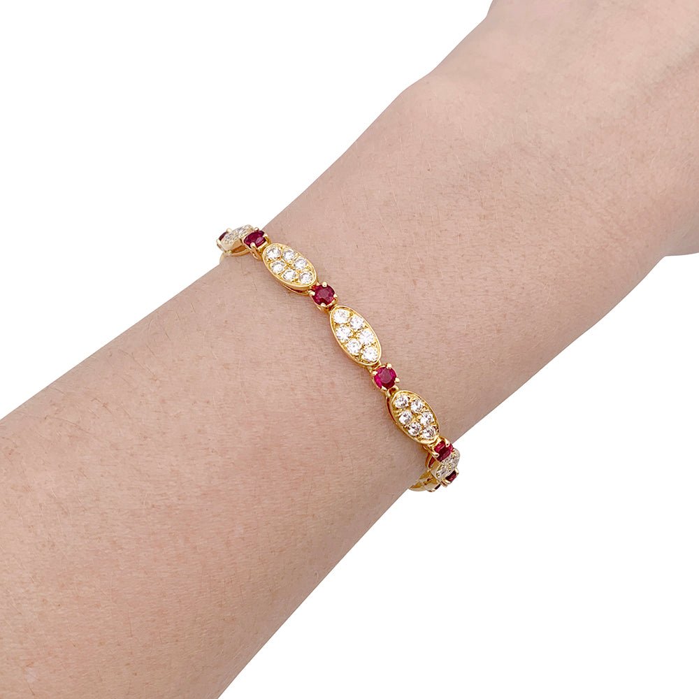 Bracelet vintage VAN CLEEF & ARPELS en diamants, rubis et or jaune. - Castafiore