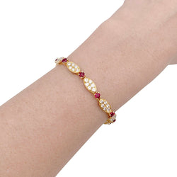 Bracelet vintage VAN CLEEF & ARPELS en diamants, rubis et or jaune. - Castafiore