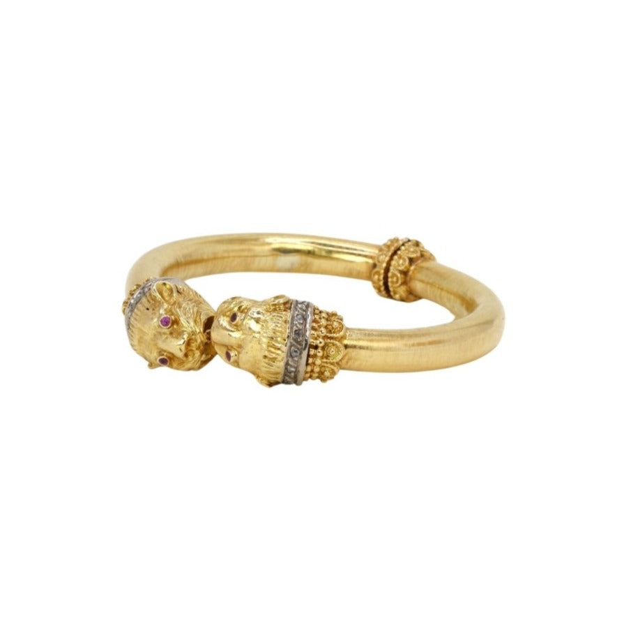 Bracelet ZOLOTAS "tête de felins" en or jaune, rubis et diamants - Castafiore